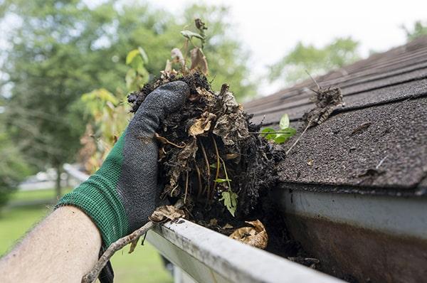 gutter cleaning involves removing debris, flushing out the gutters, and performing visual inspections for any damage or blockages
